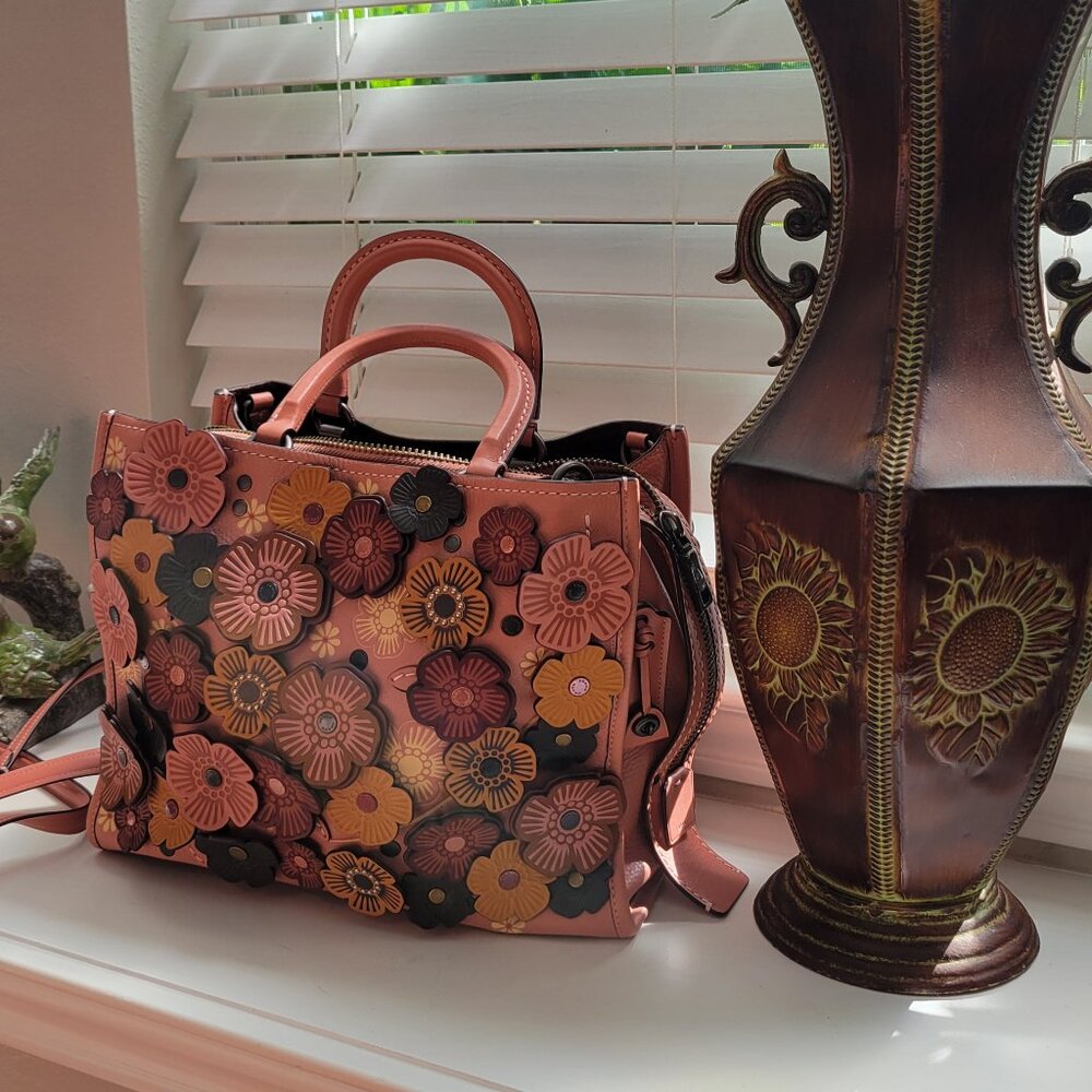 NWOT Coach Rogue tea rose in pink